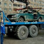 Норильск избавляется от брошенного транспорта: машины мешают работе коммунальщиков